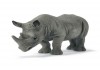 Скульптура носорога из металла.