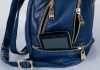 Фото Женский кожанный рюкзак -стильный и практичный акссесуар для каждой.
